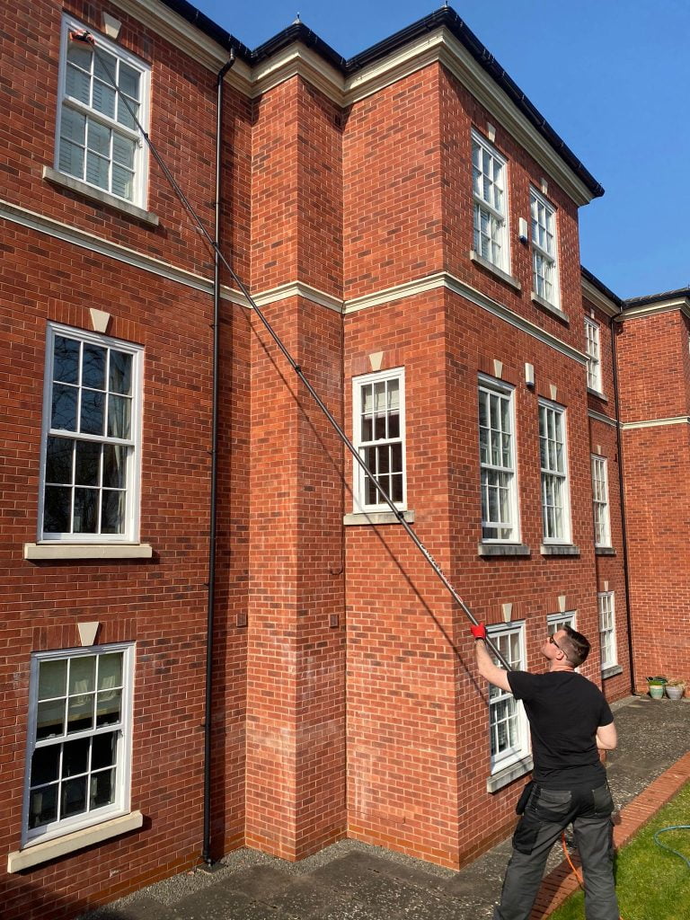 Window clenaing at a three storey house from the safety of the ground